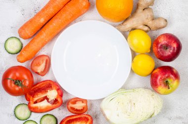 Seasonal Fresh fruit and vegetables on grey background, Vegetarian and vegan diet. Sustainable lifestyle, good, real plant-based foods. Veganuary concept