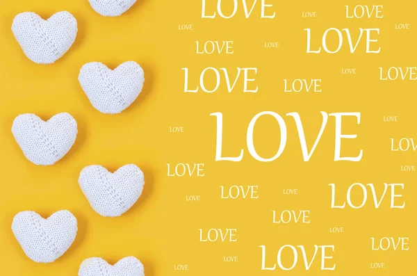 Many White Knitted Hearts Inscription Love Yellow Background Concept Valentine — 스톡 사진