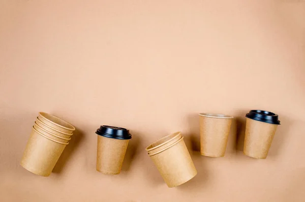 Top View Disposable Kraft Paper Cups Beige Background Kraft Paper — Stock Photo, Image