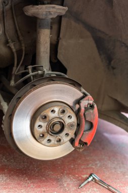 braking system of a red painted disc type car