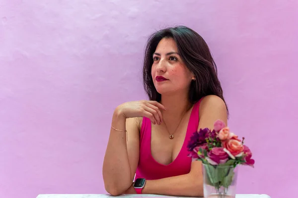 stock image girl dressed in pink blouse for photos on purple background