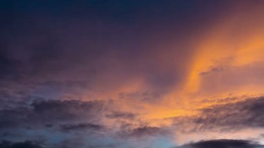 Clouds moving and rolling on twilight to dark sky background. 4k time lapse footage
