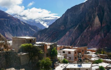 View of Iruya, a small town in the mountains in the north of Argentina with small houses and mountains in the background clipart