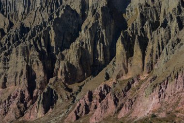 Close up of colorful mountains as background in the Altiplano of Argentina. Iruya, Salta, Northwest of Argentina clipart