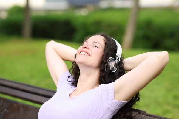 Happy Woman Resting Sitting Bench Listening Music Park — Stock Photo, Image