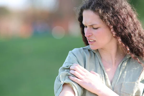 Woman Complaining Scratching Itchy Arm Park — Stockfoto