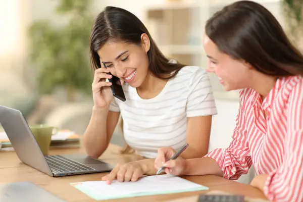 Two Happy Women Talking Phone Contract Home — Stock Photo, Image