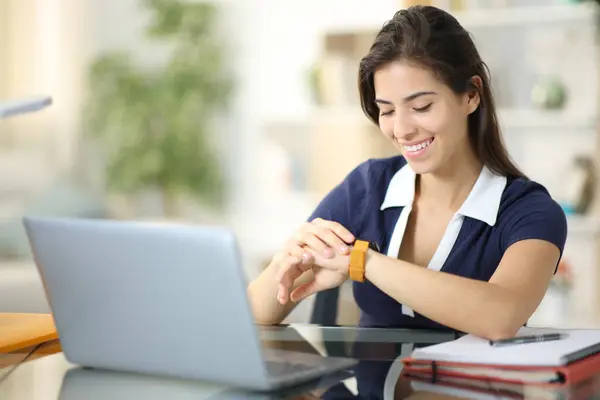 Happy Student Checking Smartwatch Sitting Home — Stock Photo, Image