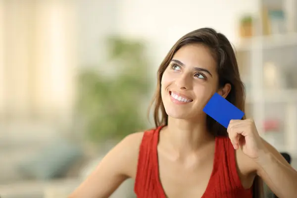 Happy Woman Dreaming Showing Blank Credit Card Home — Stock Photo, Image