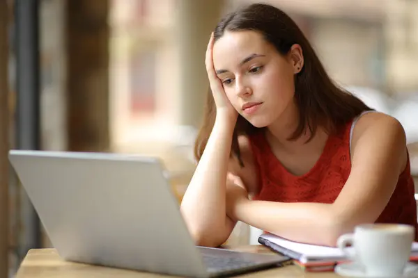 Apathetic Student Watching Online Content Laptop Coffee Shop Terrace — Stock Photo, Image