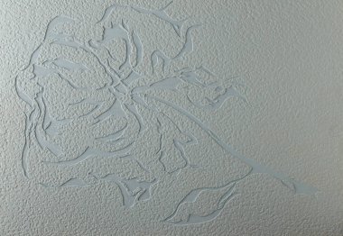 Dekoratif alçı dokusu, gül şekilli kabartmalı süs malzemesi arkaplanı. Modern iç ayrıştırma, sıva