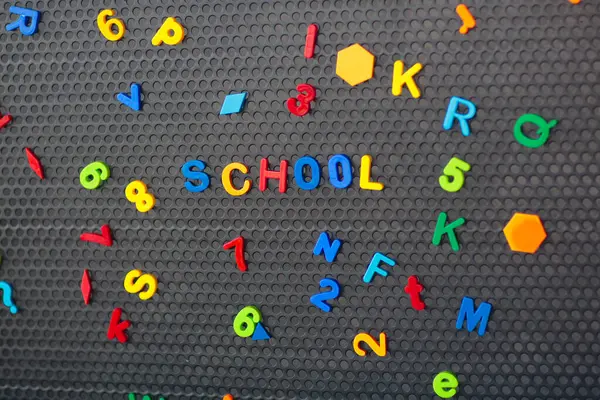 Boy Spelling Out Word School Magnet Letters Black Board Preschool Стокове Фото