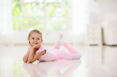 Baby ballet studio. Little ballerina in dance class. Cute girl in pink tutu and leotard learning to dance. Classic choreography for kids. Child dancer exercising. Kids practice full split.