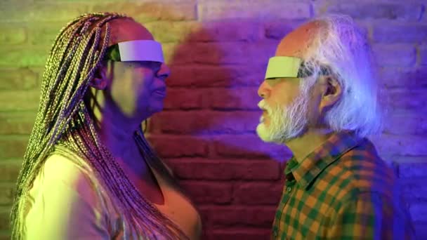 Multiracial Senior Couple Having Fun Touch Faces Virtual Reality Glasses — ストック動画
