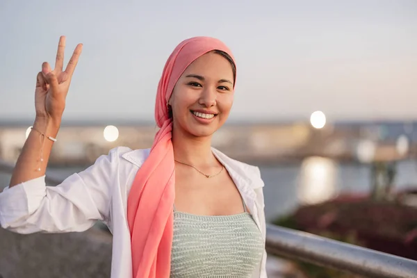 asian woman fight cancer pink scarf