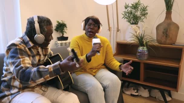 Senior Couple Home Singing Playing Guitar — Stock videók