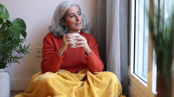 Portrait Happy Healthy Older Senior Woman Sitting Home Drinking Coffee — Vídeo de stock