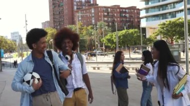 Diverse friends walking in the city - students in the city campus, travelers.