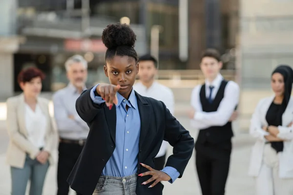 empowered african american woman boss company business employee team. pointing finger, fired.