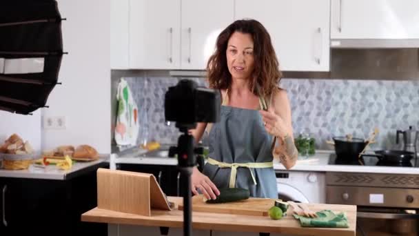 Mature Woman Cooks Home Making Videos Social Media Digital Content — стоковое видео