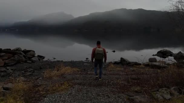 Adventurous Backpacker Man Norway Fog Walking Fjord — Video