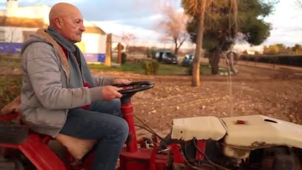 Senior Man Driving Tractor Plowing His Land Cultivate — Stock Video