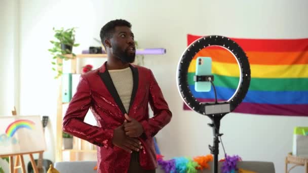 African American Man Adjusts His Dazzling Red Sequin Jacket Adding — ストック動画