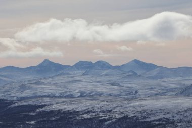 View of Rondane National Park from Dovrefjell National Park Norway clipart