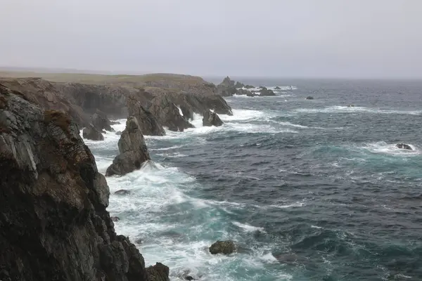 stock image A rocky shoreline on the Atlantic Ocean  in The Dungeon Provincial Park, Bonavista Peninsula Newfoundland and Labrador, Canada.