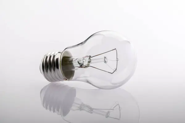 Creative light bulb on a light background