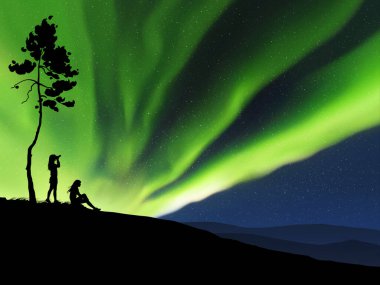 Tepede dinlenen iki kadın. Dağ tırmanışı. Yeşil kutup ışıkları