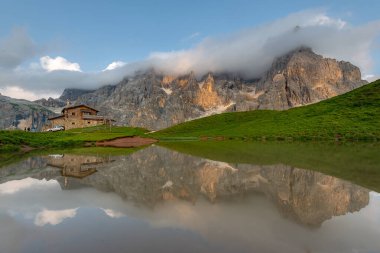 Hidden Gem of Dolomites, Baita Segantini and scenic landscape. clipart