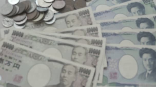 Ιαπωνικά Χαρτονομίσματα Γιεν Και Ιαπωνικά Κέρματα Γιεν Για Χρήματα Φόντο — Αρχείο Βίντεο