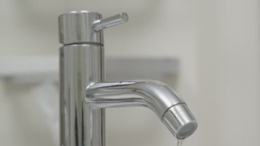 save water, Some people forgot turn off water so man turn off. Turn off the water after not use for saves energy and save money reduces global warming. environmental, for future.