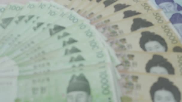 Корейська Валюта Багато Корейських Банкнот Вкладено Столі Переможцем Валюта Кореї — стокове відео