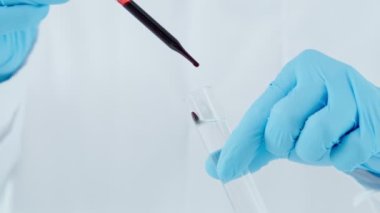 Scientist analyze biochemical samples in advanced scientific laboratory. Medical professional use dropper mix microbiological developmental of viral. Biotechnology research in  science lab. cosmetic