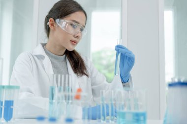 Scientist analyze biochemical sample in advanced scientific laboratory. Medical professional check chemical mix microbiological developmental of viral. Biotechnology research in science lab. cosmetic