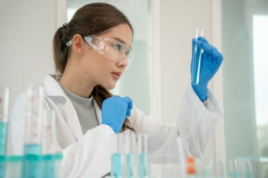 Scientist analyze biochemical sample in advanced scientific laboratory. Medical professional check chemical mix microbiological developmental of viral. Biotechnology research in science lab. cosmetic