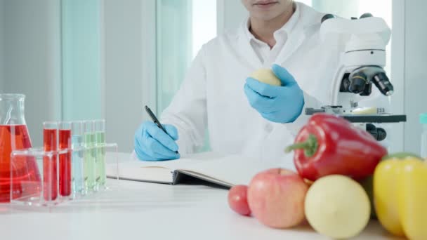 Scientist Check Chemical Fruit Residues Laboratory Control Experts Inspect Concentration — Wideo stockowe