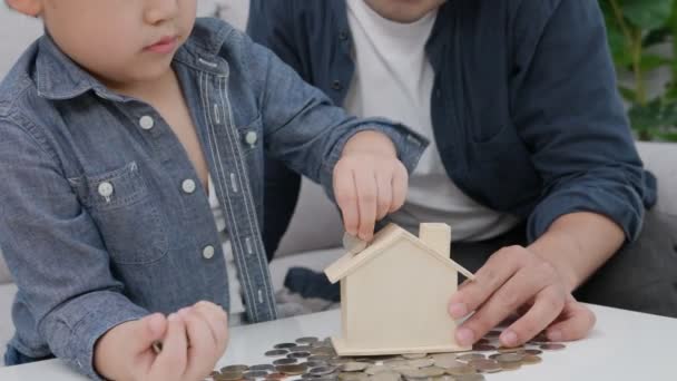 Money Children Putting Coin Saving Wealth Finance Insurance Investment Education — Vídeo de stock