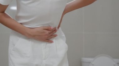 Constipation and diarrhea in bathroom. Hurt woman touch belly  stomach ache painful. colon inflammation problem, toxic food, abdominal pain, abdomen, constipated in toilet, stomachache, Hygiene