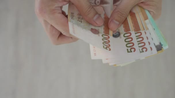 Karşılığında Değeri Temsil Etmek Için Kullanılan Kore Para Birimi Kazanılan — Stok video