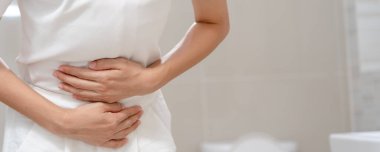 Constipation and diarrhea in bathroom. Hurt woman touch belly  stomach ache painful. colon inflammation problem, toxic food, abdominal pain, abdomen, constipated in toilet, stomachache, Hygiene
