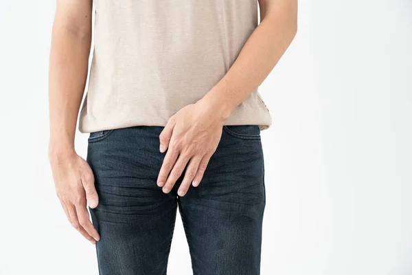 stock image Man hold hand in front of private parts feeling discomfort from disease and inflammation. Venereal, testicular cancer. bladder problems, erectile dysfunction, premature ejaculation, prostate cance