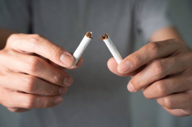 No smoking. man stop smoke, refuse, reject, break take cigarette, say no. quit smoking for health. world tobacco day. drugs, Lung Cancer, emphysema , Pulmonary disease, narcotic, nicotine effect
