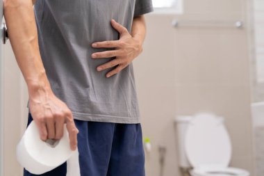 Constipation and diarrhea in bathroom. Hurt man touch belly  stomach ache painful. colon inflammation problem, toxic food, abdominal pain, abdomen, constipated in toilet, stomachache, Hygiene