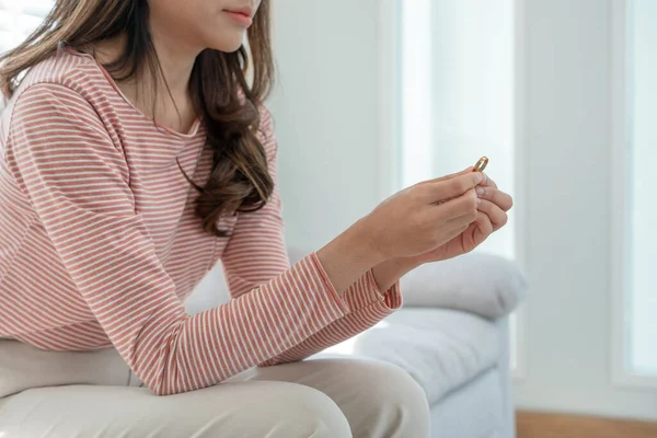 Divorce. Woman remove married ring. Couples desperate and disappointed after marriage. Husband wife sad, upset and frustrated after quarrels conflict. distrust, love problems, betrayals, family, lover