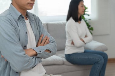 Divorce. Asian couples are desperate and disappointed after marriage. Husband and wife are sad, upset and frustrated after quarrels. distrust, love problems, betrayals. family problem, teenage lov