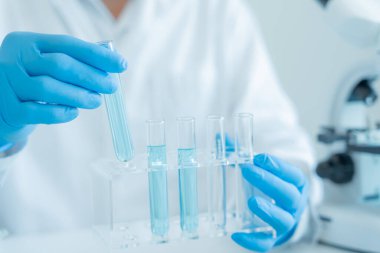 Scientist analyze biochemical sample in advanced scientific laboratory. Medical professional check chemical mix microbiological developmental of viral. Biotechnology research in science lab. cosmetic
