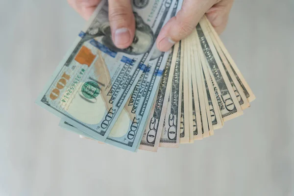 stock image USD currency , Many dollar bank notes Placed on the table.The  Dollar is the currency of USA that is used to change, buy, sell, accumulate, and invest in united kingdom's state people.